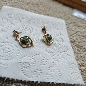 gold tone earrings with gemstone green stone centers beads
